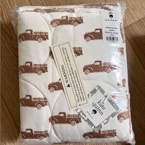 Kate Quinn Classic Circle Quilt cinnamon farm trucks